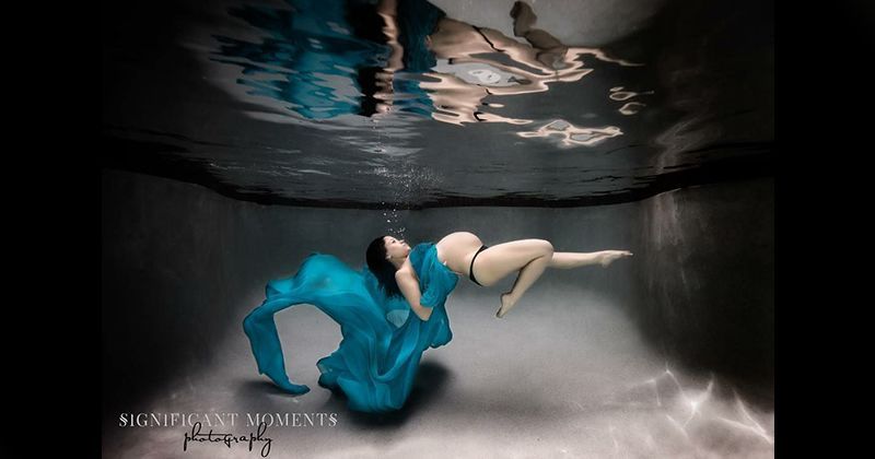 2. Setiap lekukan ada ibu hamil nampak indah dalam foto underwater
