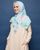 7. Model segi empat tarik atas menonjolkan motif kain hijabmu