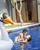 7. Menghabiskan waktu luang berenang bersama sang Mama