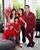 2. Kompak outfit merah saat perayaan imlek