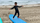 3. Berfoto atas papan surfing
