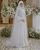 7. Dress putih saat Akad Nikah a la Lindswell Kwok