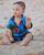5. Keseruan Zayn ketika bermain pantai