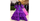 6. Whoopi Goldberg mencolok warna ungu