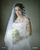 3. Veil pernikahan dikenakan Jessica Iskandar memiliki bordir bertuliskan janji pernikahannya