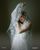 4. Selain itu, gaun putih Jessica juga dilengkapi veil bertuliskan janji pernikahannya