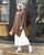1. Sweater dress panjang cocok dipadukan hijab pleated skirt putih