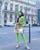 1. Mengenakan tube dress hijau neon, Shandy terlihat fun and colorful