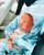 9. Baby Izz mengenakan hoodie biru bermotif tie dye