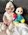 6. Potret Baby Guzelim bersama boneka Cocomelon