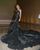 8. Anitta dress vintage dari Versace