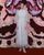 6. Bisa Pesta, Riley Keough kenakan embroidered white tulle dress dari koleksi Spring-Summer 2023