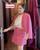 6. Nagita Slavina memakai busana bernuansa shocking pink menjadi Barbie