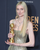 4. Elizabeth Debicki, hadir perhiasan berwarna antique silver