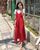 10. Tampil feminim dress merah bunga-bunga