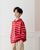 10. Sweter longgar warna merah putih