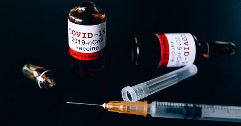 joker with card - Pexels/nataliya-vaitkevich