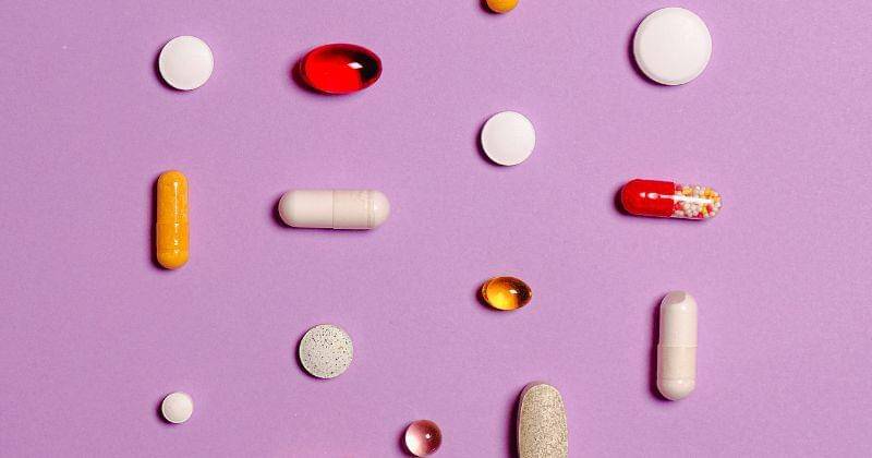 joker with card - Pexels/Annashvets