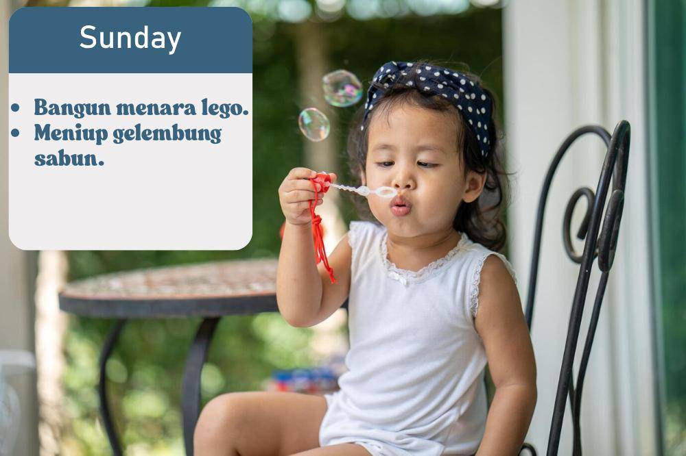 Anak meniup gelembung sabun