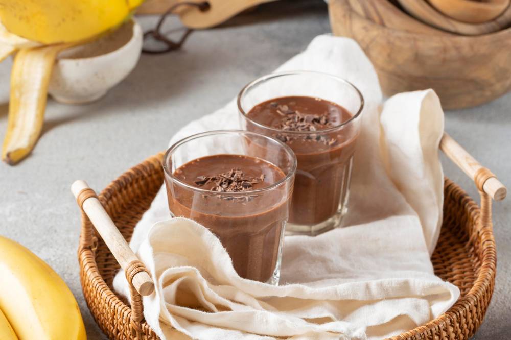 Pudding coklathttps://www.freepik.com/free-photo/high-angle-chocolate-smoothie-with-bananas_11128555.htm#fromView=search&page=1&position=14&uuid=0af2f0f6-fe19-43d7-b3a5-df77ad13706d&query=choco+pudding