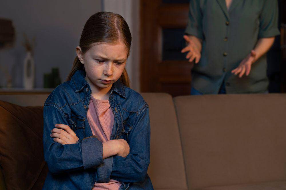 Young child suffering from abuse by parent