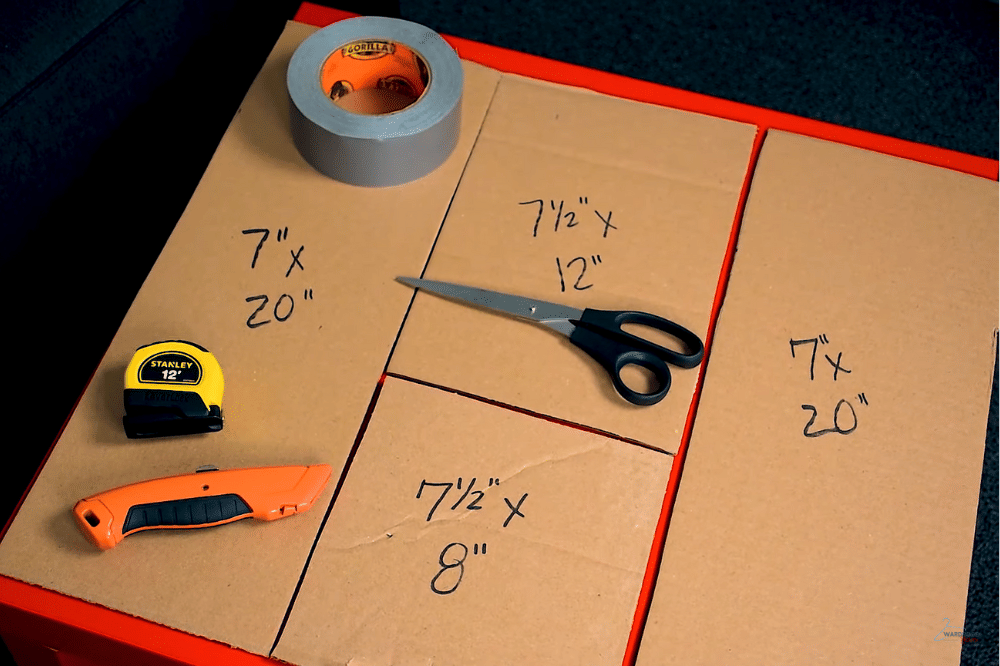 Kardus yang sudah dipotong dan alat