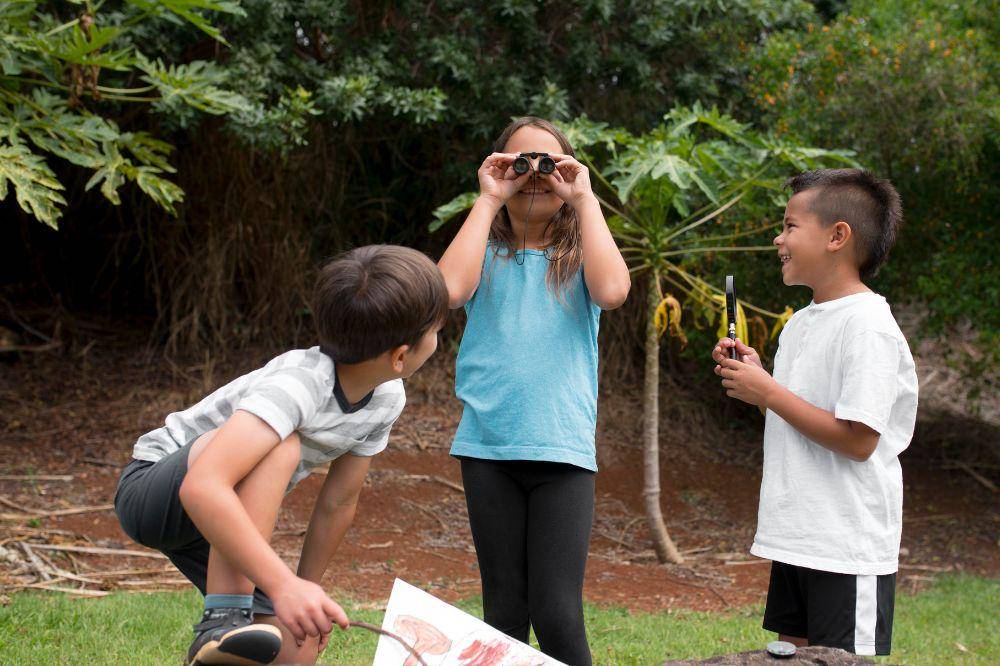 Best friends participating in a treasure hunt outdoors