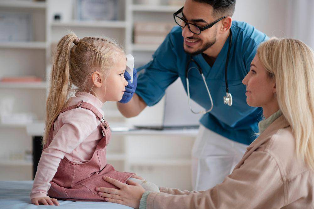 Doctor doing their work in pediatrics office