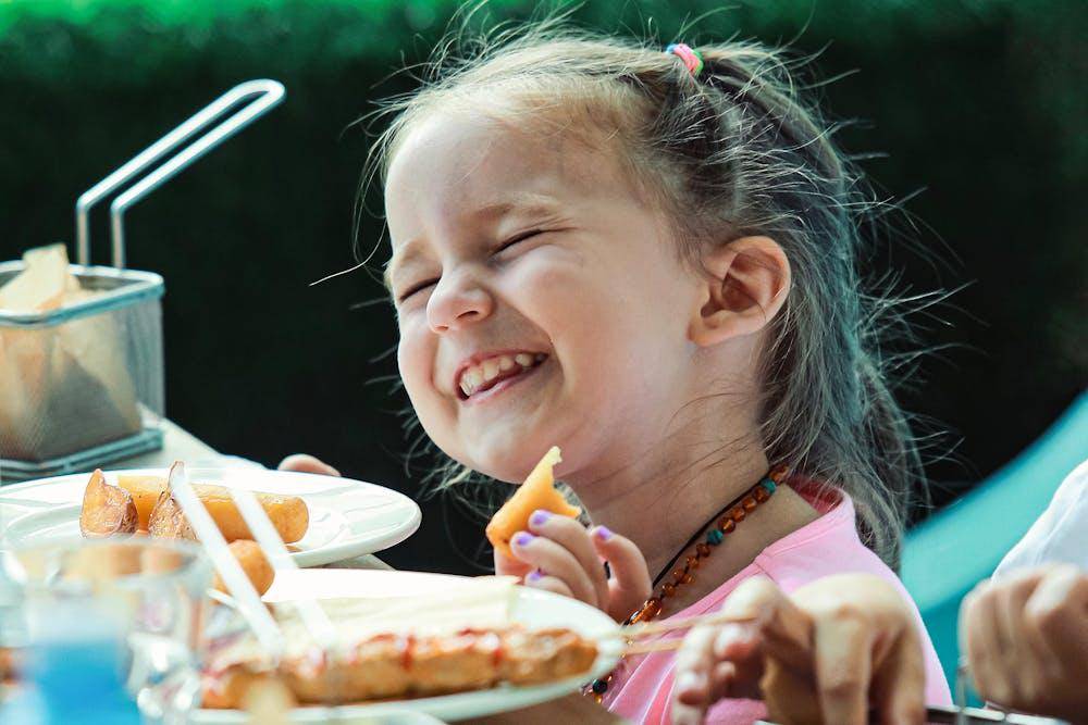portrait of a girl eating