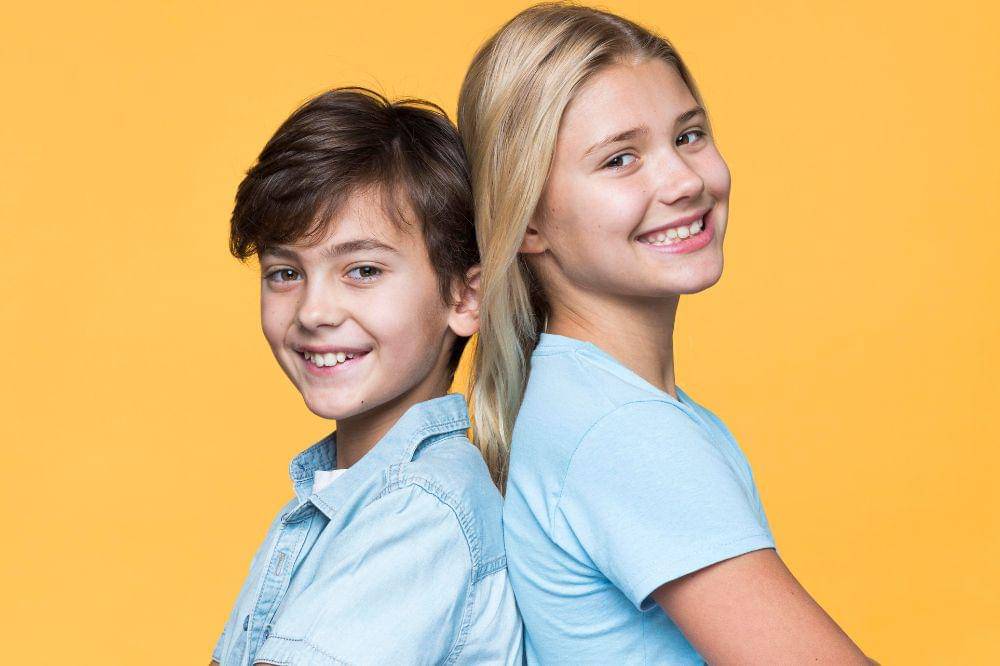 Siblings smiling together