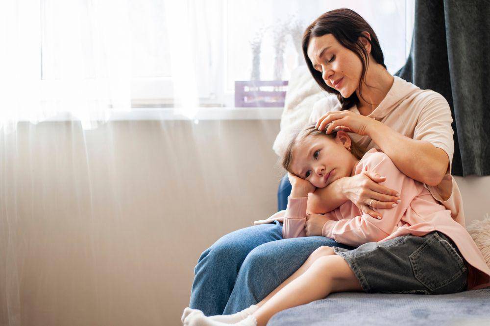 Beautiful mother holding her daughter