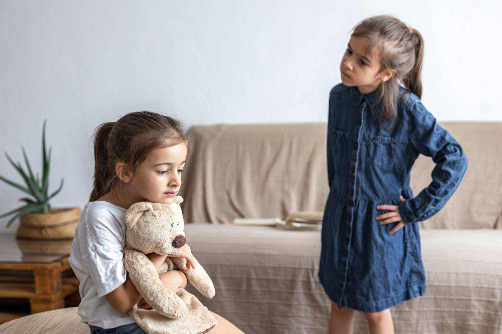 Small children quarrel over toys