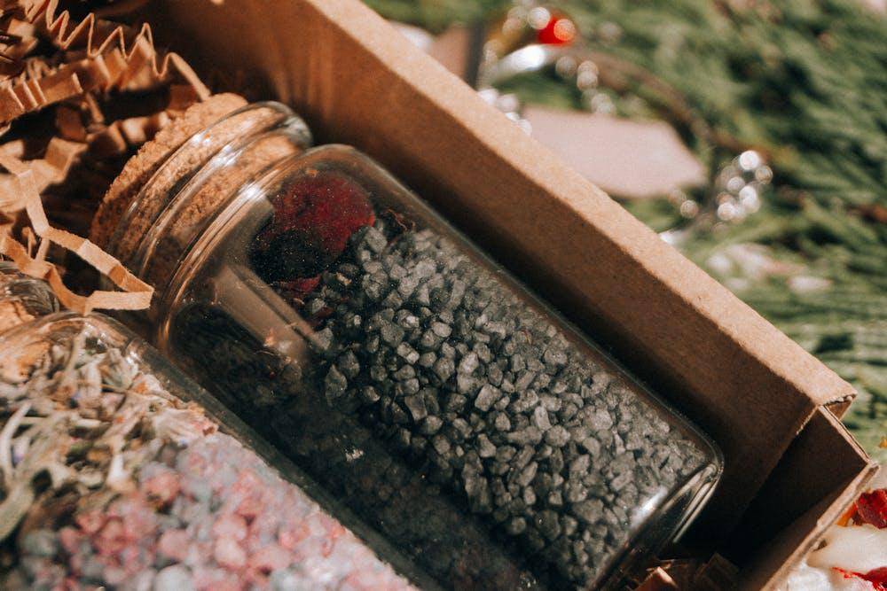 close up photo of spice on a small glass bottle