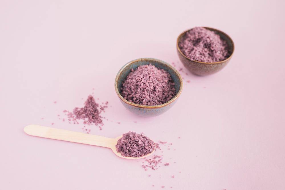 sea salt bowl spoon pink background