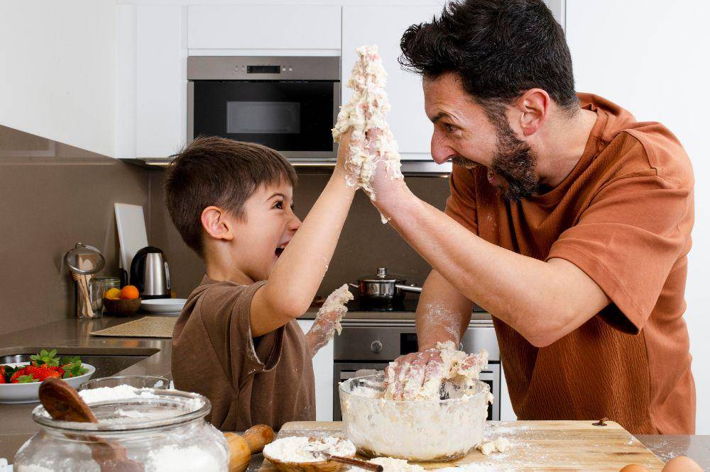 Father and kid high five