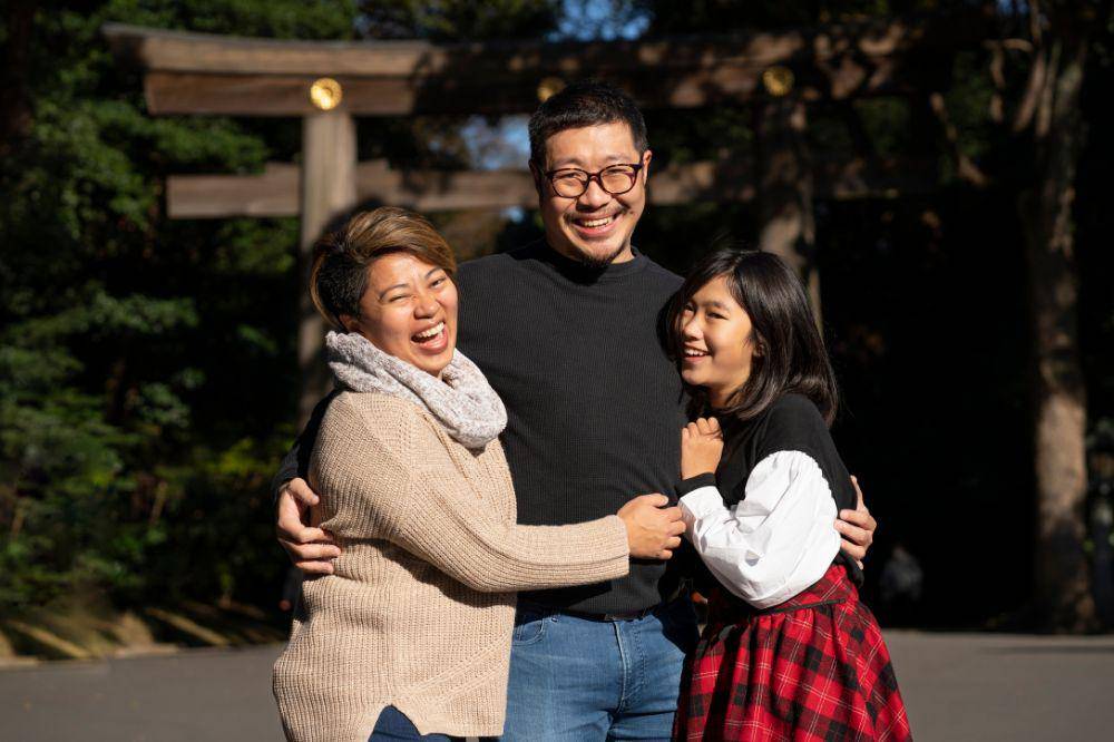 family members holding each other