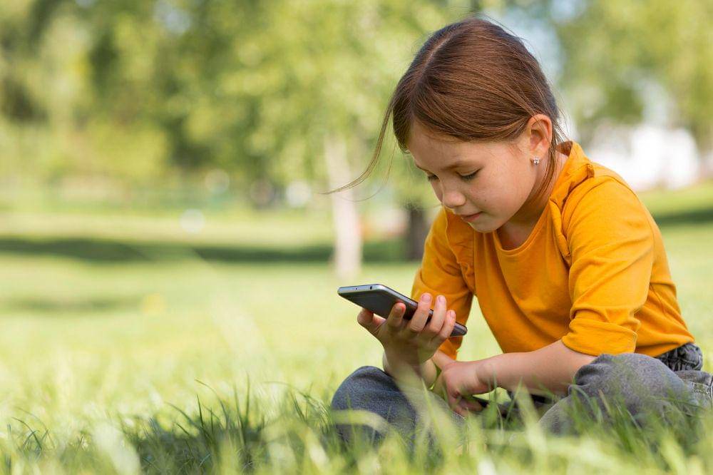 girl holding smartphone