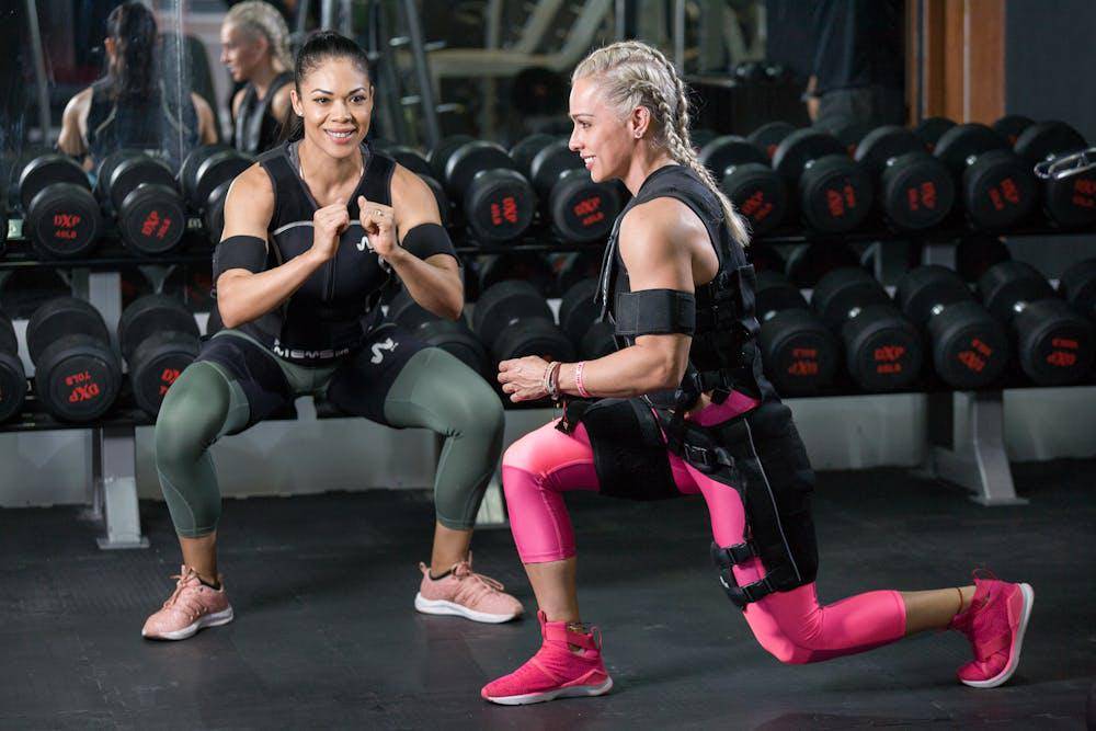 women exercising at the gym