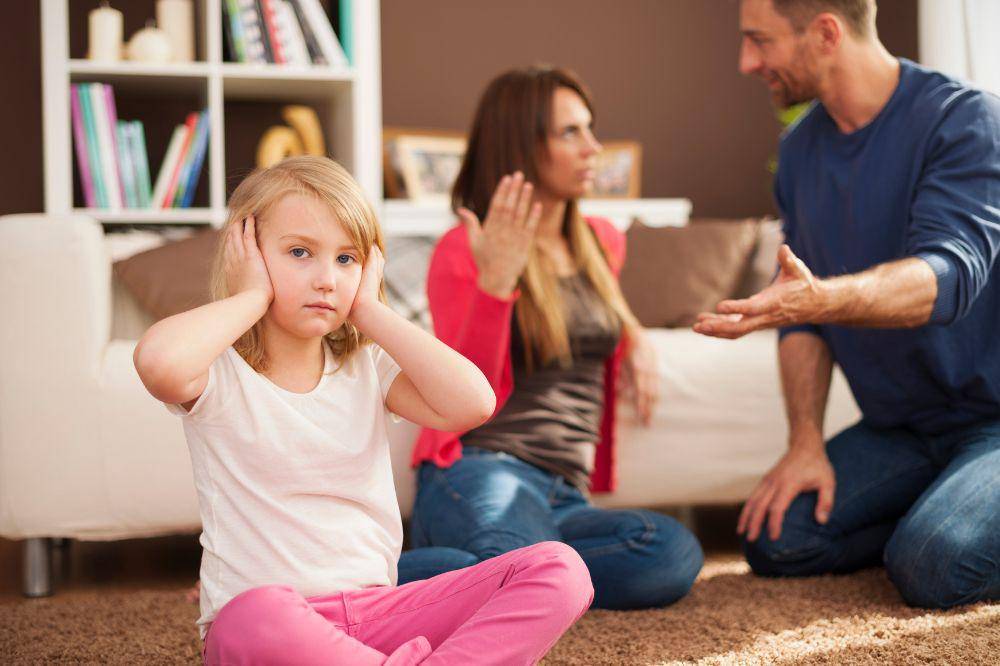 Little girl doesn't want to hear arguing