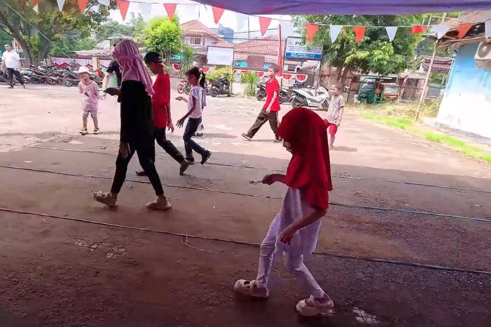 Lomba bawa kelereng