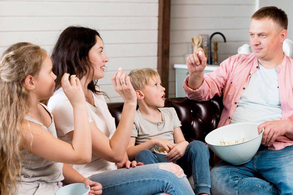 family eating popcorn