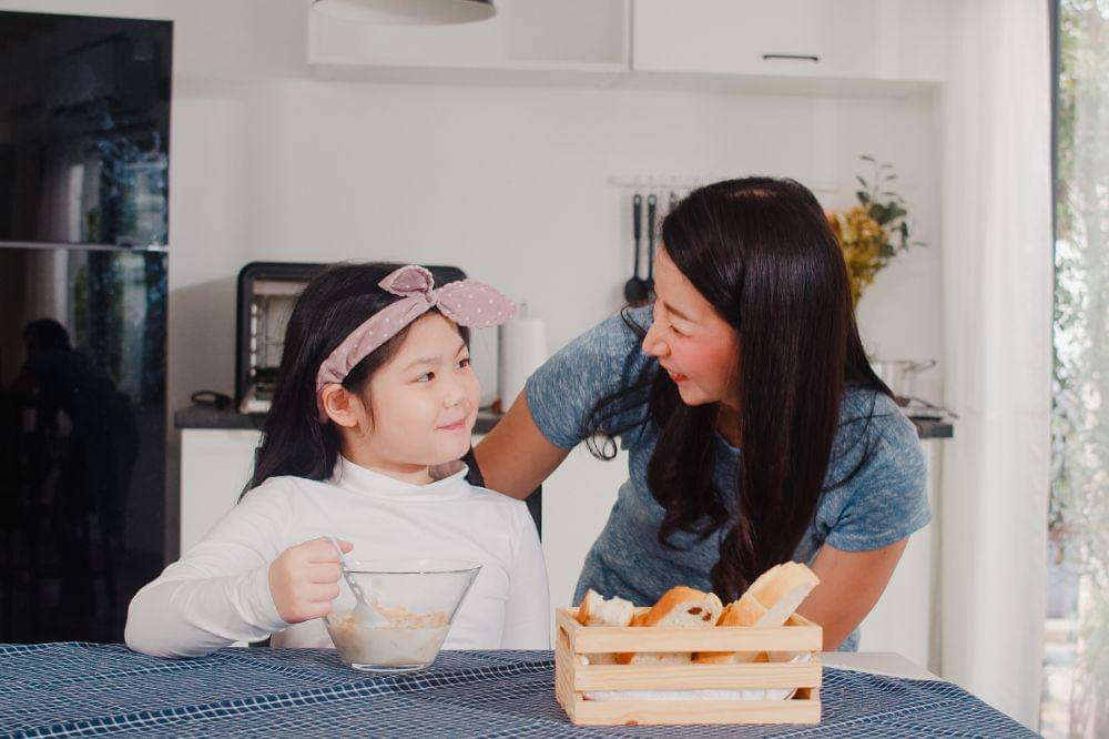 mom and daughter talking together
