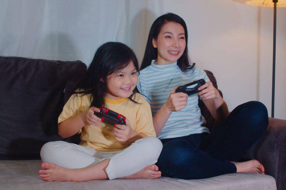 Mother and daughter playing together