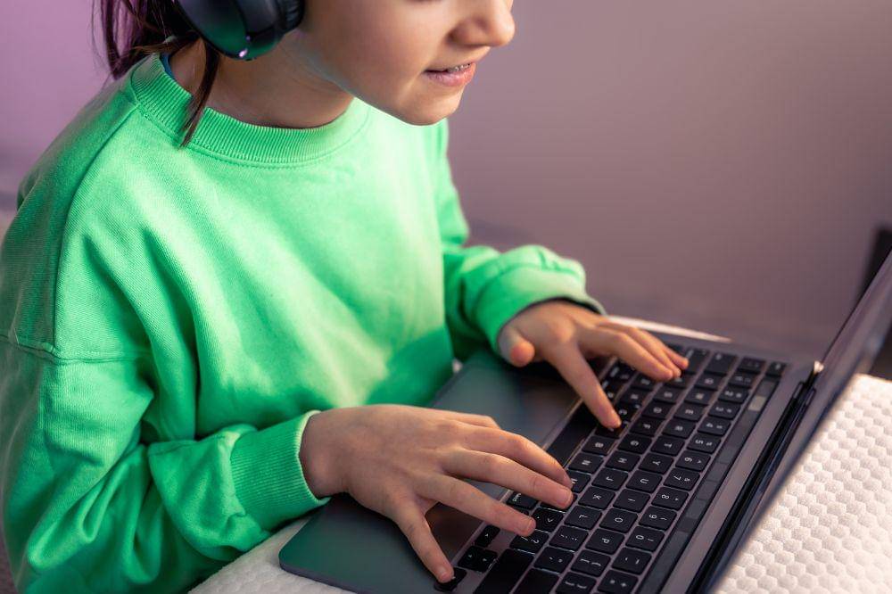 Girl playing computer