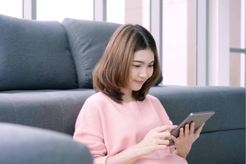 woman using tablet