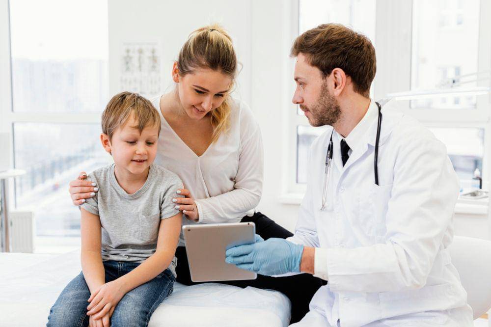 Medium shot doctor holding tablet