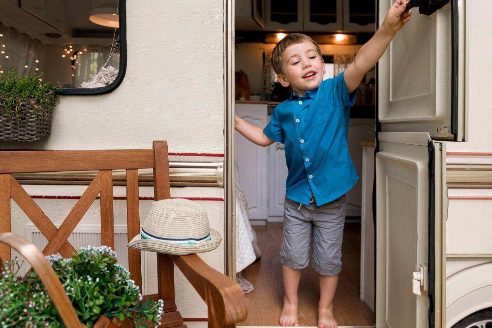 Little boy wanting to close the door