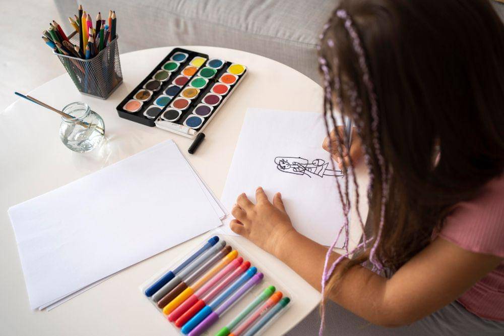 Adorable little girl drawing