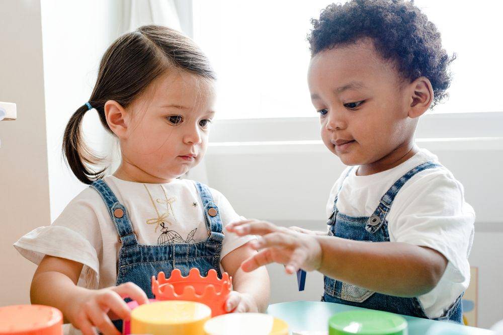 Little kids playing toy