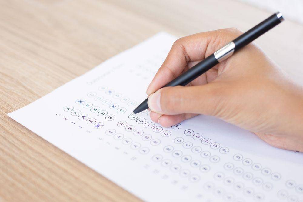 Person filling out questionary form